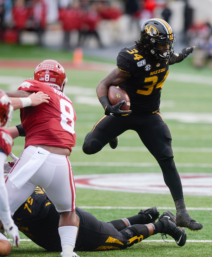 Larry Roundtree III evades the Arkansas defense
